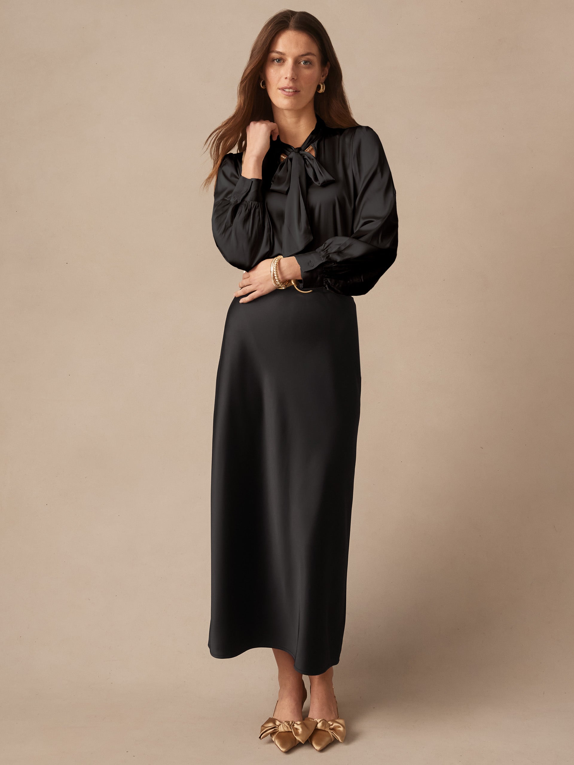 J.McLaughlin Vienna top in black made with stretch satin. 