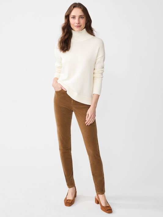 Model wearing J.McLaughlin Watson jeans in camel made with velveteen.