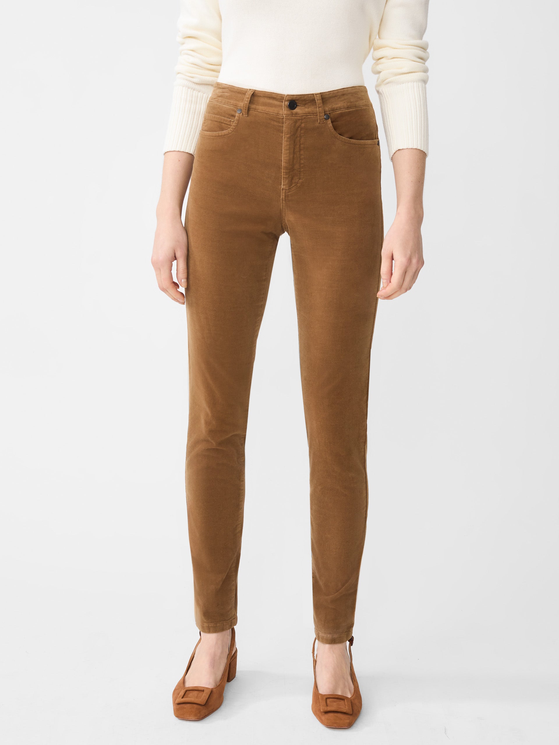 Model wearing J.McLaughlin Watson jeans in camel made with velveteen.