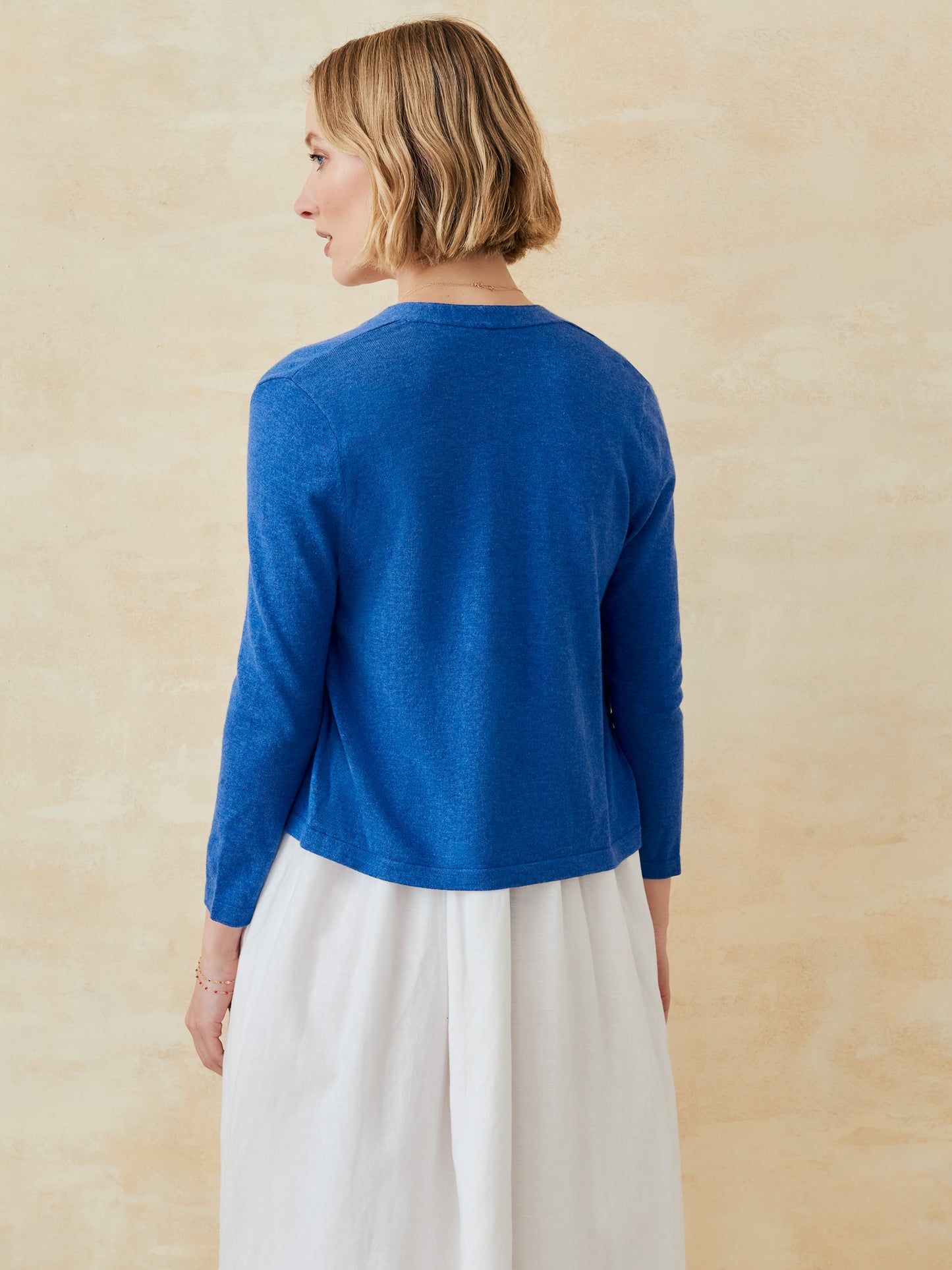 J.McLaughlin Winslow cardigan in denim blue made with cotton.