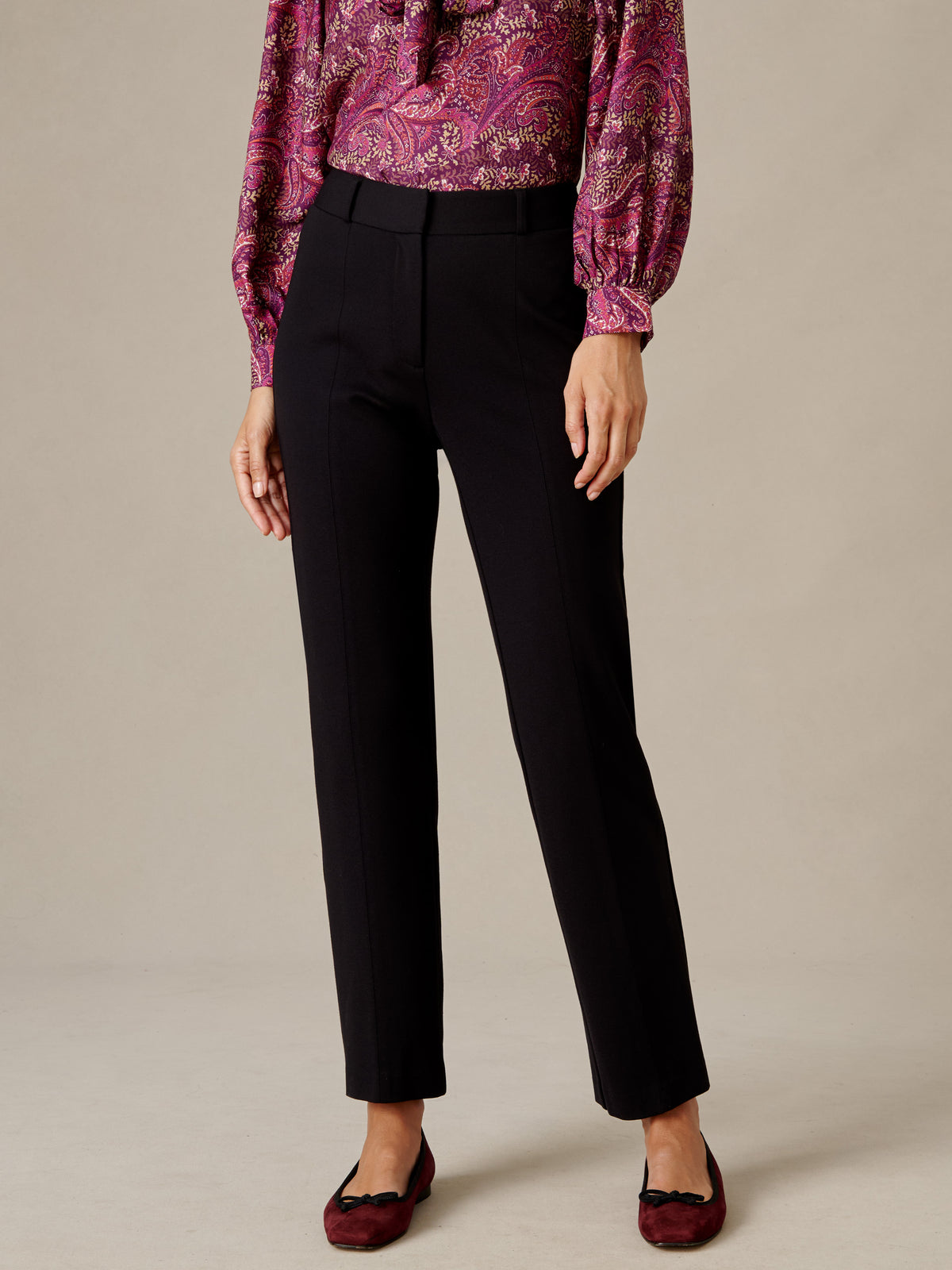 Ynez Pants by J.McLaughlin in black styled with a paisley blouse and burgundy flats for a polished day to night look