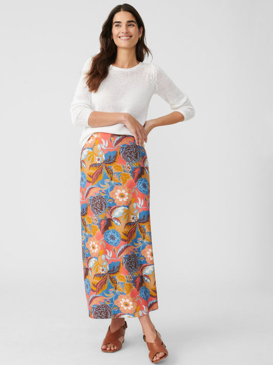 Model wears J.McLaughlin Zahara skirt in blue/coral/orange made with polyester/spandex.